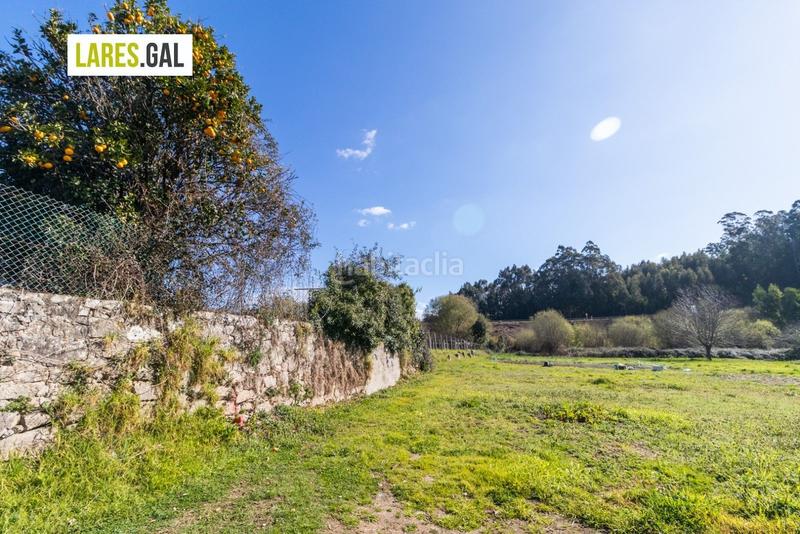 Foto 43df6cc2-3d8d-4e89-9cd2-991a7b8456a0. Finca rústica parcela muy soleada en ameixoada en Moaña