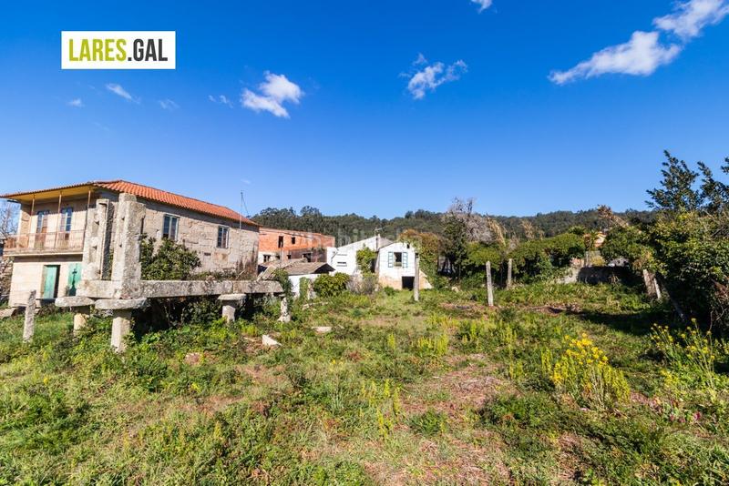 Foto 46cc8a48-3dd7-41b6-bf0f-4fe62c176079. Finca rústica parcela muy soleada en ameixoada en Moaña
