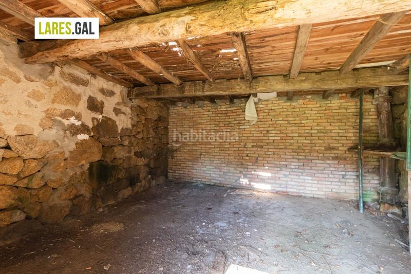 Foto f0d35ada-8b76-4e48-8e3e-5c95e8cd08cb. Finca rústica parcela muy soleada en ameixoada en Moaña