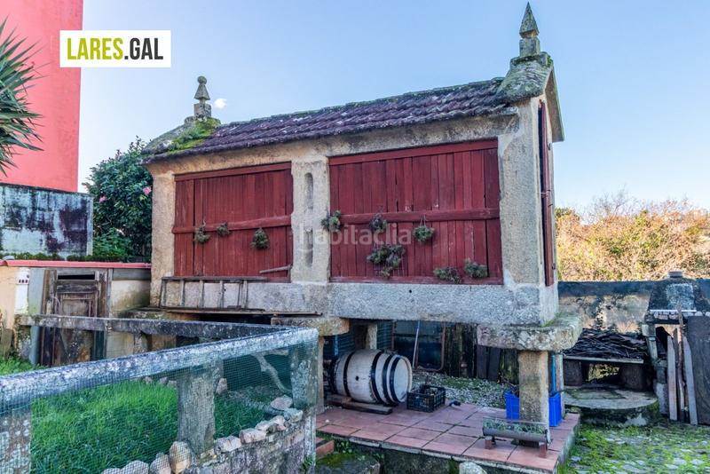 Foto 0b1a1c8e-d698-4ef7-8581-9f97e4aa6e05. Casa amplia casa de piedra a la venta en Darbo Cangas