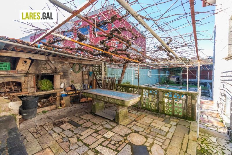 Foto 0c349560-aa74-4fc1-b109-a4434a6dfbbb. Casa amplia casa de piedra a la venta en Darbo Cangas