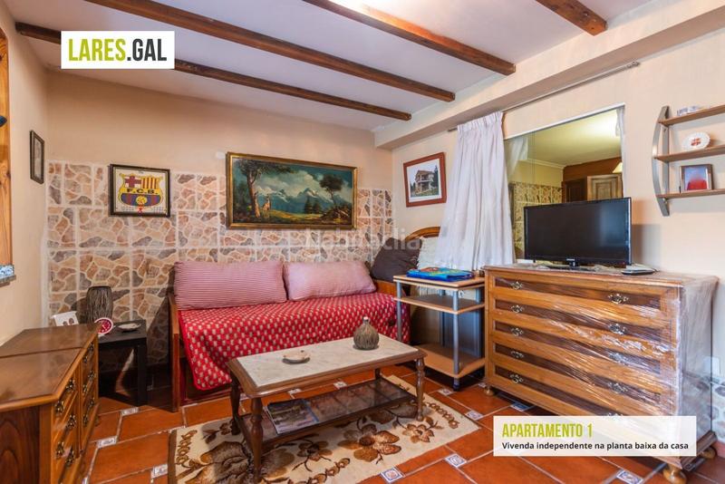 Foto 0fd0d6c5-c82d-47d4-be39-4e4509291663. Casa amplia casa de piedra a la venta en Darbo Cangas