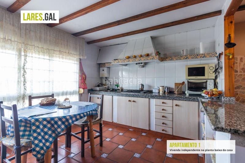 Foto 16e1a13c-c63c-4fc2-a941-e1777ca51089. Casa amplia casa de piedra a la venta en Darbo Cangas