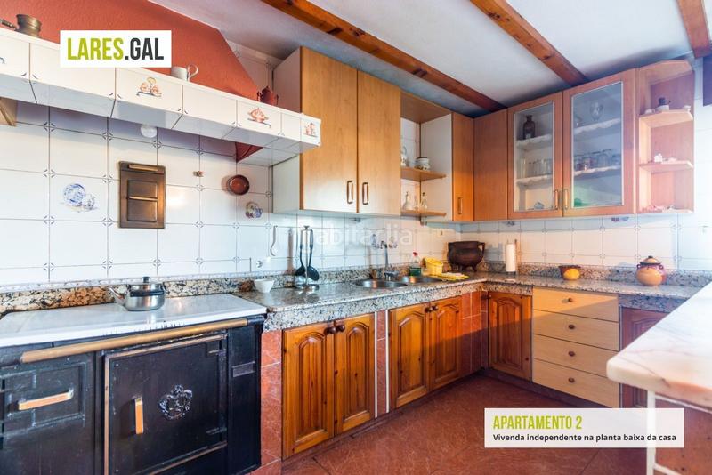 Foto 2063c31e-5d06-46b5-bdf5-2304d88b1870. Casa amplia casa de piedra a la venta en Darbo Cangas