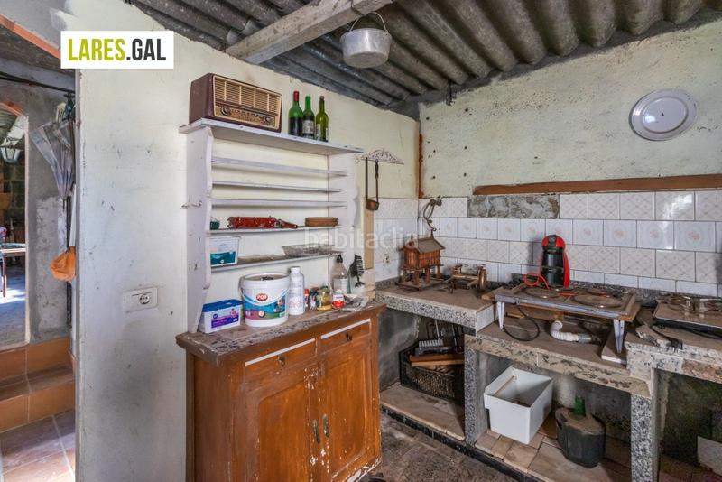 Foto 2ac6d5de-d688-4c6a-968b-a9a4bec5d375. Casa amplia casa de piedra a la venta en Darbo Cangas