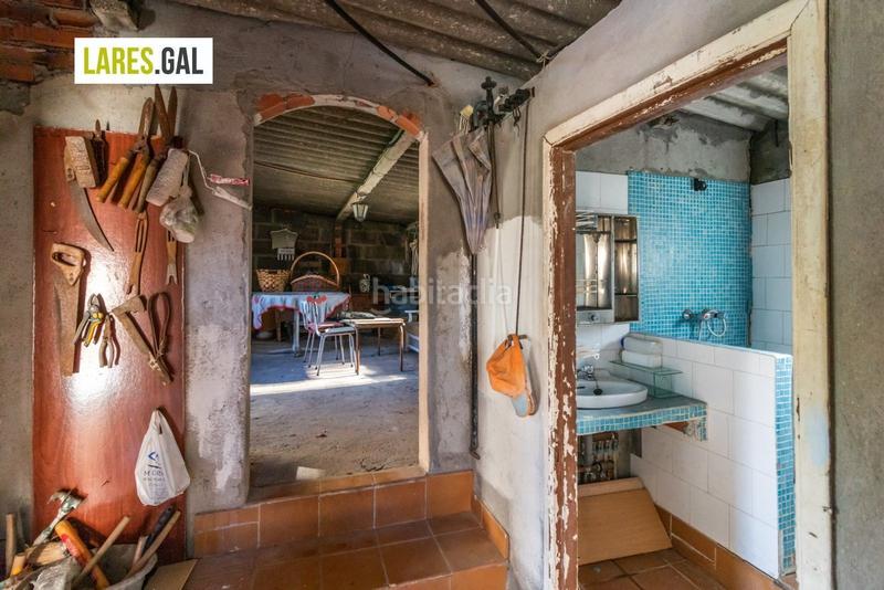 Foto 2adcc0a4-6ac6-4d08-be1e-d986facaacab. Casa amplia casa de piedra a la venta en Darbo Cangas