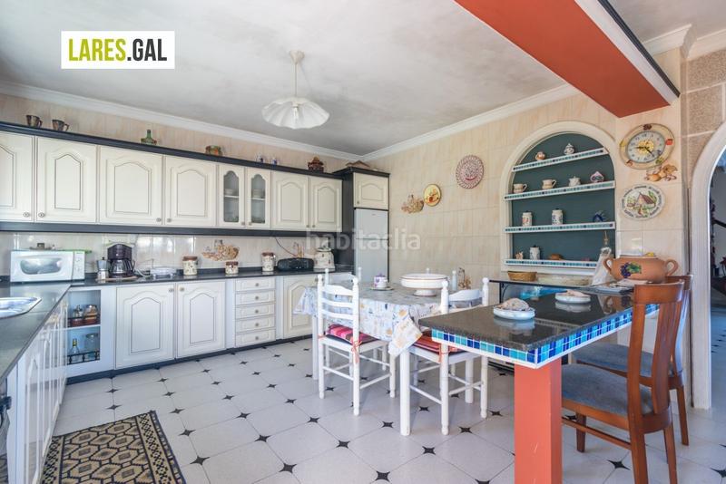 Foto 3be7f7f1-b8cb-4721-9c89-f7f763574e80. Casa amplia casa de piedra a la venta en Darbo Cangas