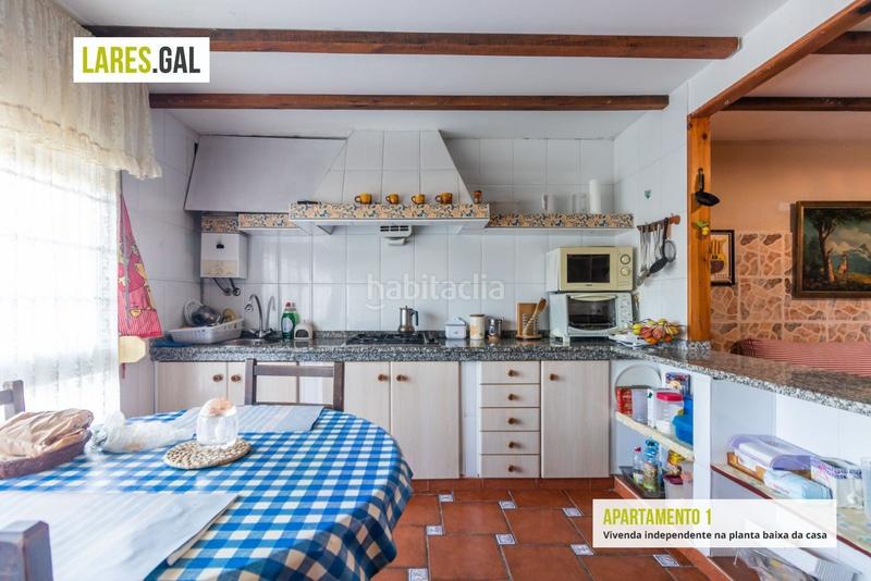 Foto 534fddaf-9c0f-43f5-b325-bd2dd1452c13. Casa amplia casa de piedra a la venta en Darbo Cangas