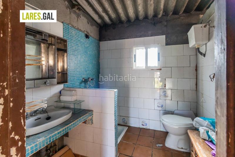 Foto fb97355a-87e6-413c-8f30-8508090e3312. Casa amplia casa de piedra a la venta en Darbo Cangas