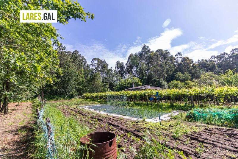 Foto 4c408106-0ad8-42dc-9c37-b3812a9cc1b0. Finca rústica terreno edificable a la venta en herbello, Aldán. en Cangas