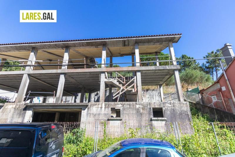 Foto 50ddae5e-a21f-4860-bce7-cd8601b86e38. Casa adossada amb aparcament a O Hío Cangas
