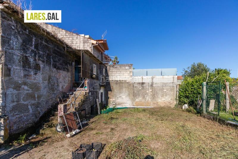 Foto 4d76b9a6-c556-478f-a25d-5d2c01c2b54d. Finca rústica a Coiro Cangas