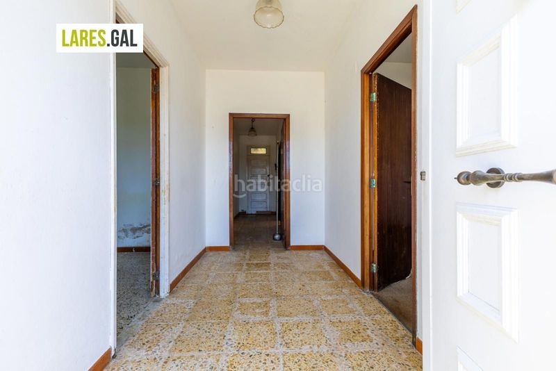 Foto 99faa0c1-03ea-4776-9c24-0e423f8ebc64. Casa amb aparcament a Coiro Cangas