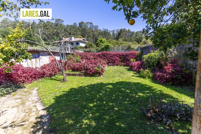 Foto a83378a7-5ac4-4202-a689-e00bd13cebe1. Casa amb aparcament a Coiro Cangas