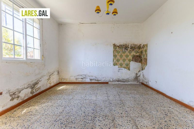 Foto bebc4aba-dc55-48f2-8327-52c2b917f605. Casa amb aparcament a Coiro Cangas