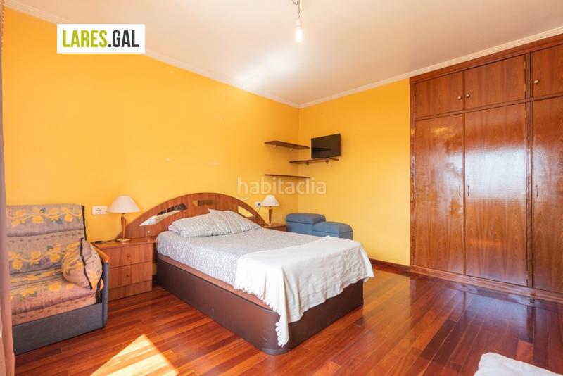 Foto 0429660f-e8ea-49c7-8b01-df1e15b487c7. Casa adosada adosado en san roque con terrazas y vistas en Cangas