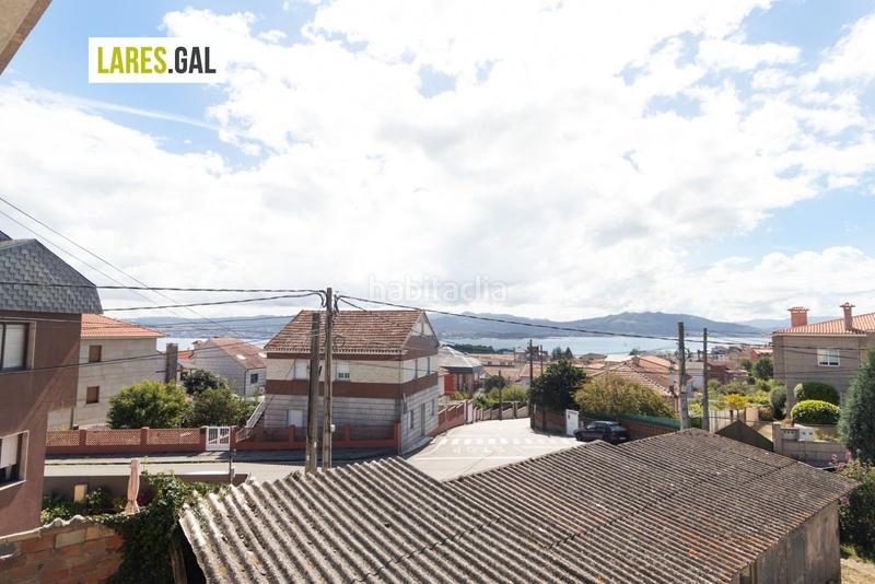 Foto 305f25da-d2ac-437b-a104-f7287cb9140c. Casa adosada adosado en san roque con terrazas y vistas en Cangas