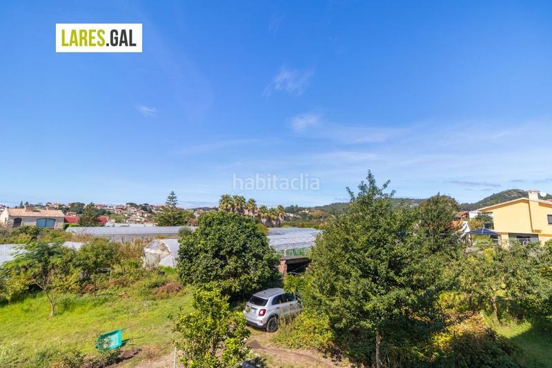 Foto 43b12c56-16bc-4806-acb8-f4fd37ca98db. Casa adosada adosado en san roque con terrazas y vistas en Cangas
