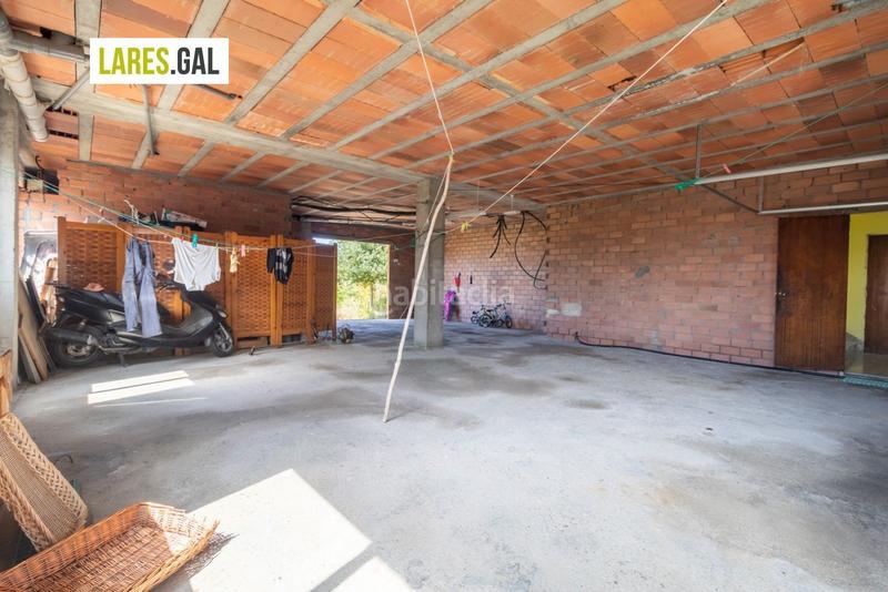 Foto 45f9363c-ff9d-4b6c-a569-57f0e0434b9d. Casa adosada adosado en san roque con terrazas y vistas en Cangas