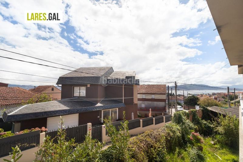 Foto 50127a3f-991b-41ed-9013-ace824f6c01a. Casa adosada adosado en san roque con terrazas y vistas en Cangas