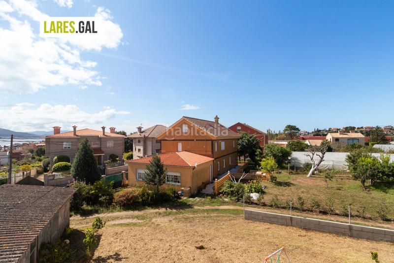 Foto 68c18f33-255d-4d13-a283-0262bb35a00e. Casa adosada adosado en san roque con terrazas y vistas en Cangas