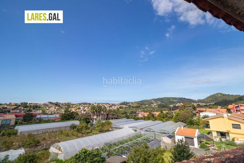 Foto 69e37223-d6f3-4bfd-ab39-5ebacd118da0. Casa adosada adosado en san roque con terrazas y vistas en Cangas