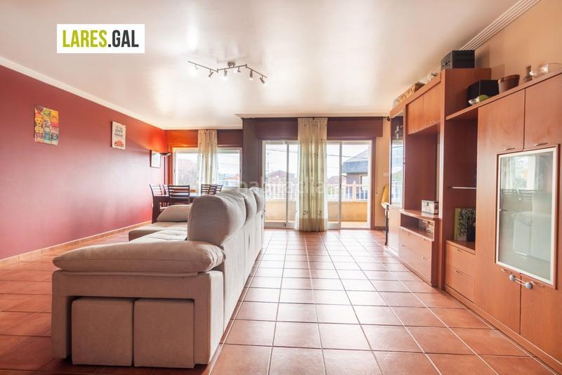 Foto 7ce98f4d-158f-4e5d-a5dd-e5ac1fcc2742. Casa adosada adosado en san roque con terrazas y vistas en Cangas
