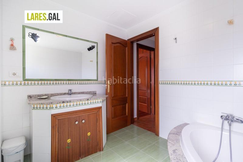 Foto 8e2bd23a-f388-49ca-aa1e-5ad0b172140f. Casa adosada adosado en san roque con terrazas y vistas en Cangas
