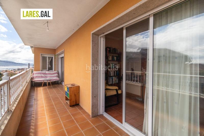 Foto ca521502-2cc4-4617-a2bc-c3e4a7c6ba90. Casa adosada adosado en san roque con terrazas y vistas en Cangas
