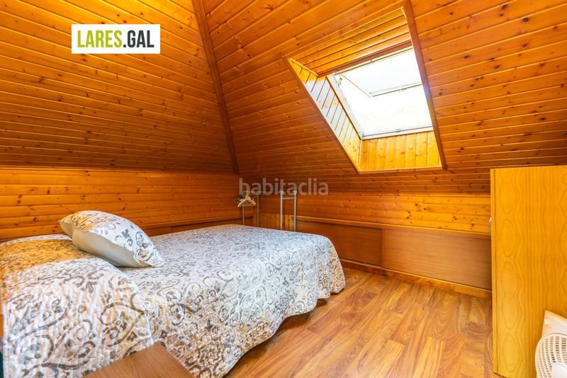 Foto 0e66e58c-402d-42f0-b550-ac792cc02609. Chalet con riscaldamento piscina in Moaña