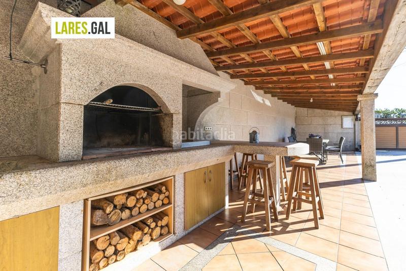 Foto 54ec4ab0-0b34-4fce-9c51-7b1763e35543. Chalet con riscaldamento piscina in Moaña