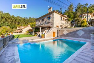 Chalet in Moaña. Chalé de piedra en moaña con vistas y piscina