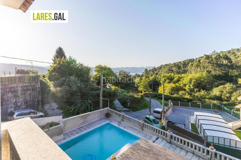 Foto 7583df4a-5948-43d3-b61f-59148116a2ad. Chalet con riscaldamento piscina in Moaña