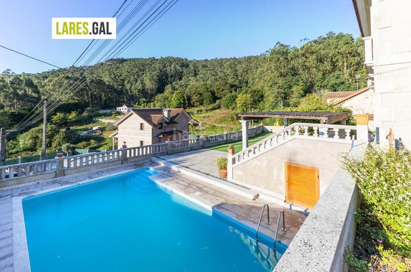 Foto 7875b112-d3cd-45bd-bd89-2e1733c57fb7. Chalet con riscaldamento piscina in Moaña