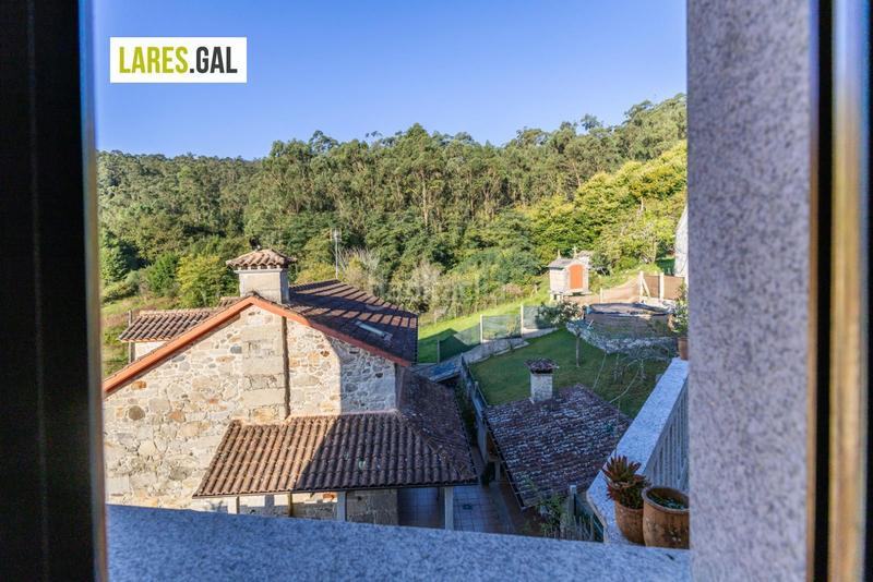 Foto c1547cd4-47f9-40da-aac0-c56d150128d0. Chalet con riscaldamento piscina in Moaña