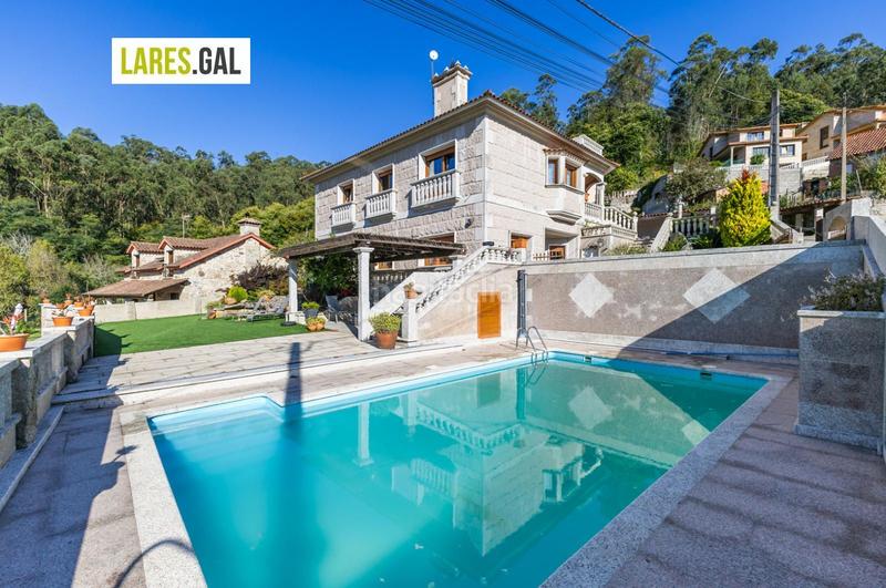 Foto c2344980-1a72-4f2b-8314-77fc3158b2da. Chalet con riscaldamento piscina in Moaña