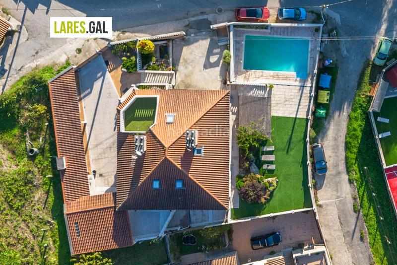 Foto ced697da-9de2-44f9-bdc6-240bb65e51dc. Chalet con riscaldamento piscina in Moaña