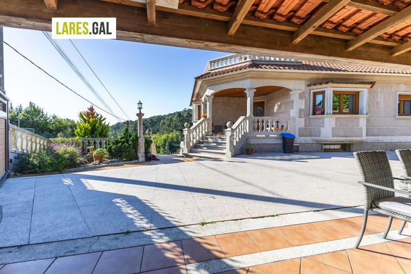 Foto d881b5a4-fb79-4ac4-b14b-0b1f99f0c82e. Chalet con riscaldamento piscina in Moaña