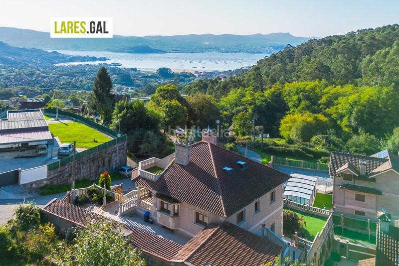 Foto df46e6b5-5fa2-4c04-8431-e24173348333. Chalet con riscaldamento piscina in Moaña