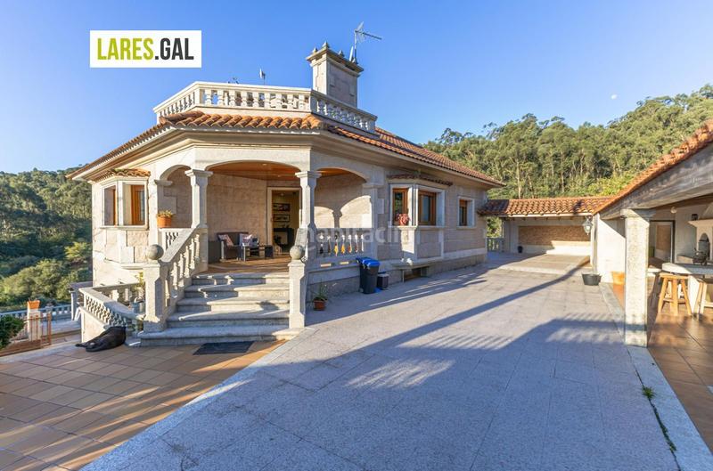 Foto f0a73093-cb6f-4993-ad9d-04c029132831. Chalet con riscaldamento piscina in Moaña