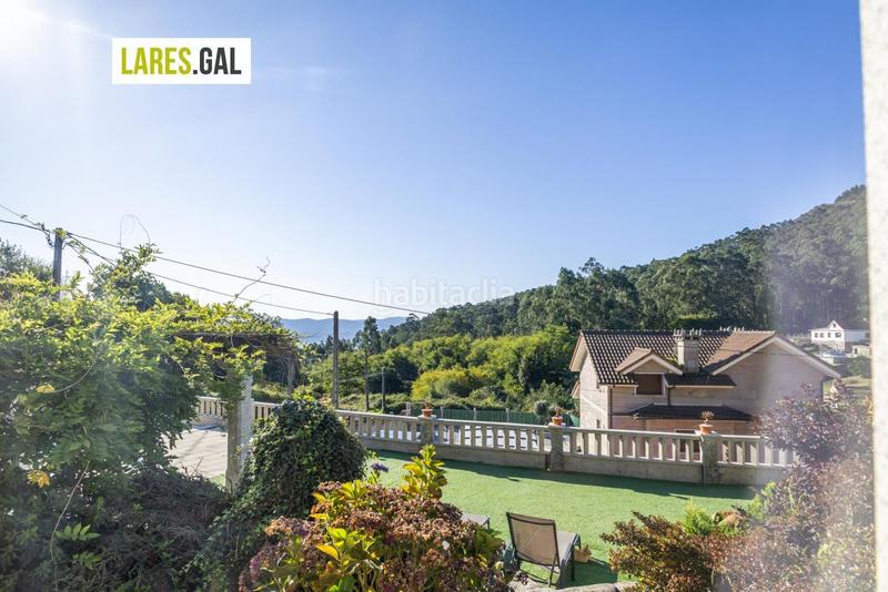 Foto f592b08f-eb3e-48c9-9843-b0b9cbb69d57. Chalet con riscaldamento piscina in Moaña
