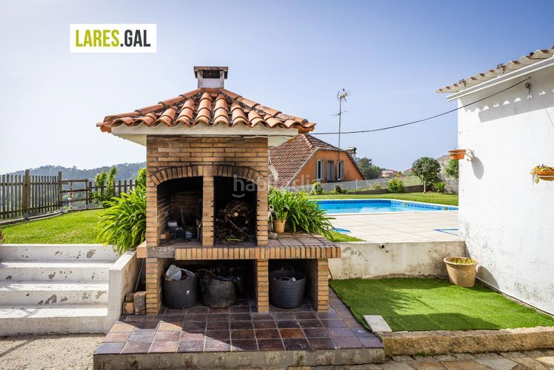 Foto 1d51854f-8498-4c22-9524-45f11246ea16. Casa amb aparcament piscina a Bueu