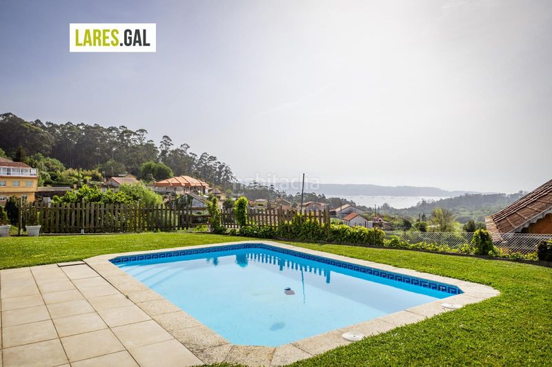 Foto 288b0e60-ea30-4298-b410-abd313f1e5c2. Casa amb aparcament piscina a Bueu