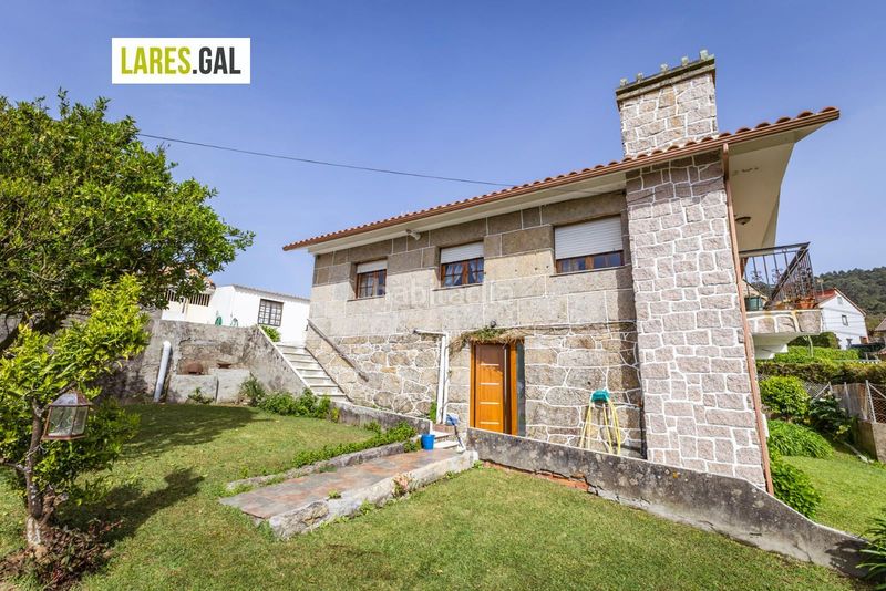 Foto 5bc53d6f-9a4c-40e2-af82-ac78b1485501. Casa amb aparcament piscina a Bueu