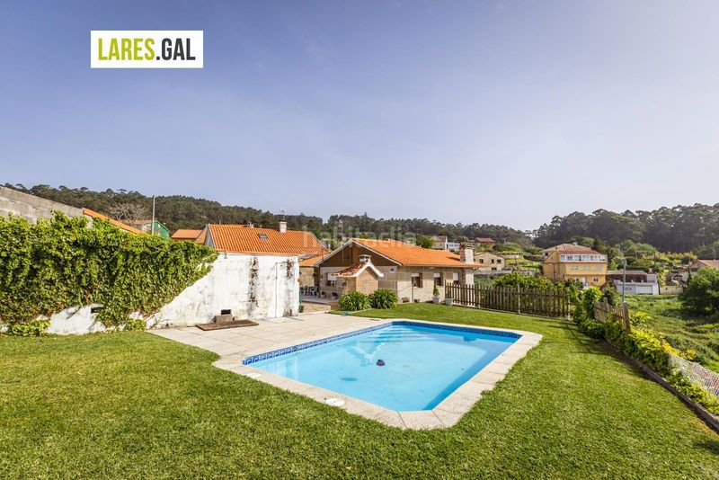 Foto b6aa7c4c-3b44-468d-ad22-1eae904f82c6. Casa amb aparcament piscina a Bueu