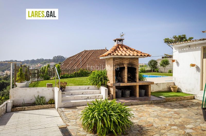 Foto bb674506-83ed-4cf4-9420-4e3fa81327e3. Casa amb aparcament piscina a Bueu