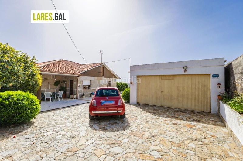 Foto c06f0af3-be0d-405b-a0bd-17a78ee87acb. Casa amb aparcament piscina a Bueu