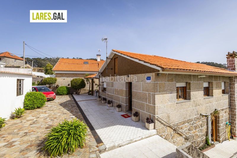 Foto d7037848-e51b-46f1-b475-3f54629f7efd. Casa amb aparcament piscina a Bueu