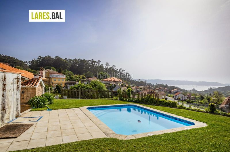 Foto fc919d73-094a-4788-baf6-77ca7f7c6536. Casa amb aparcament piscina a Bueu