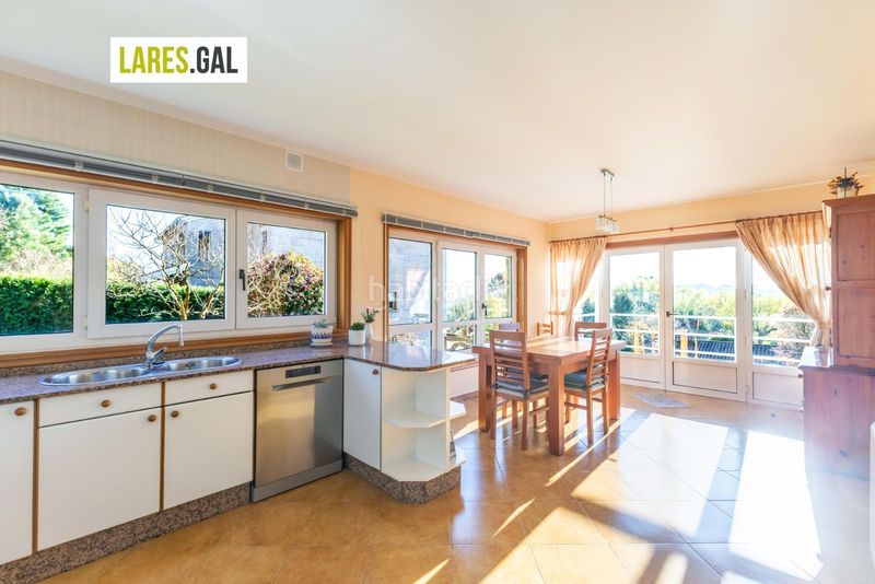 Foto 29b99889-6cbd-4a41-93a6-204c120f3e18. Chalet casa de piedra en serra poñente con jardín en Cangas